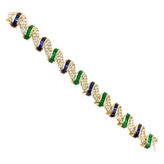 18 Karat Diamond, Emerald and Sapphire Curved Link Bracelet