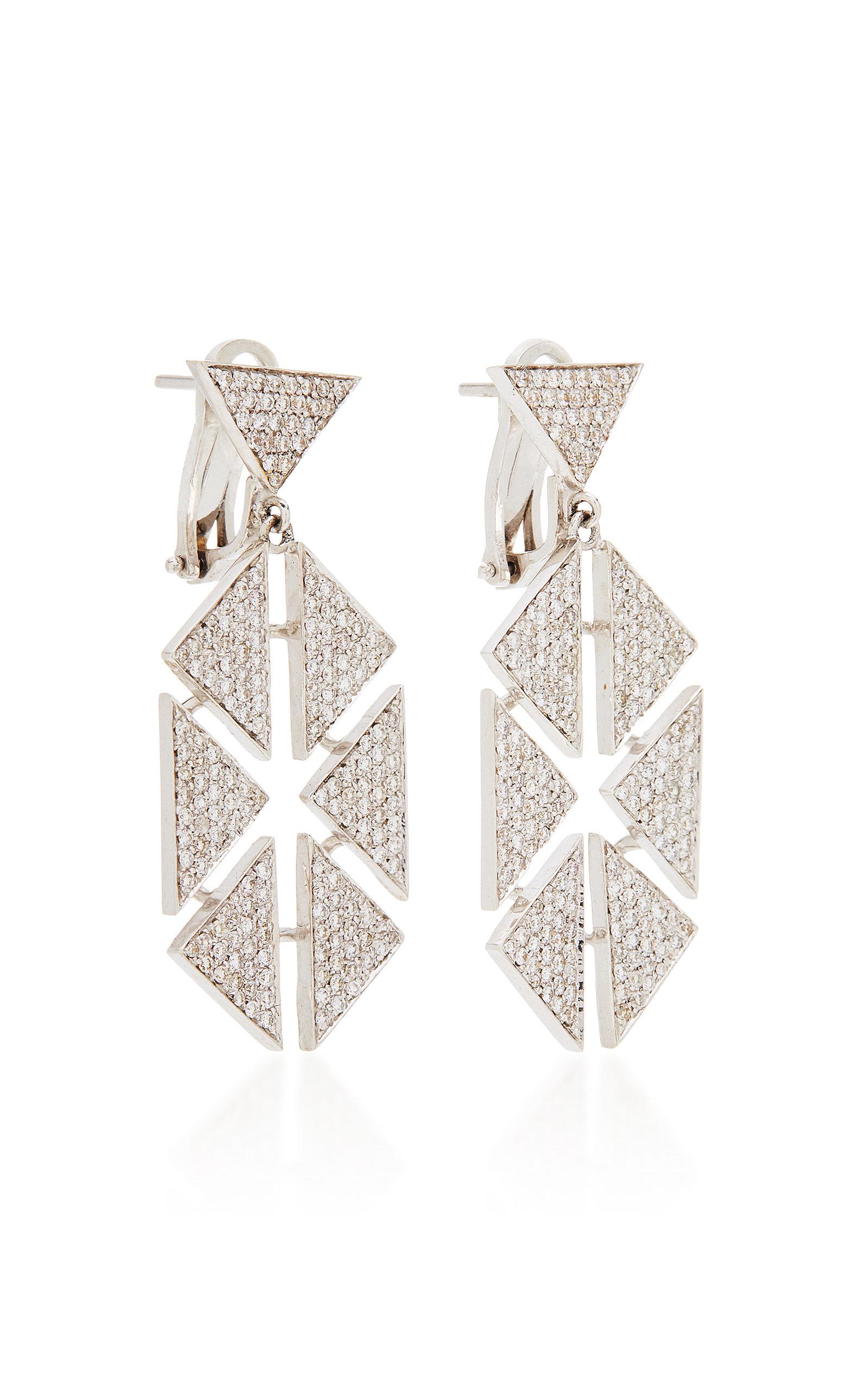 18 Karat White Gold Diamond Floating Triangle Geometric Earrings feature one white diamond pave triangle stud with a drop of 6 pave diamond triangles facing inward with negative space in between each and set in 18k White Gold 
Includes 18k White