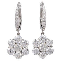 18 Karat Diamond Flower Earrings on a Diamond Wire