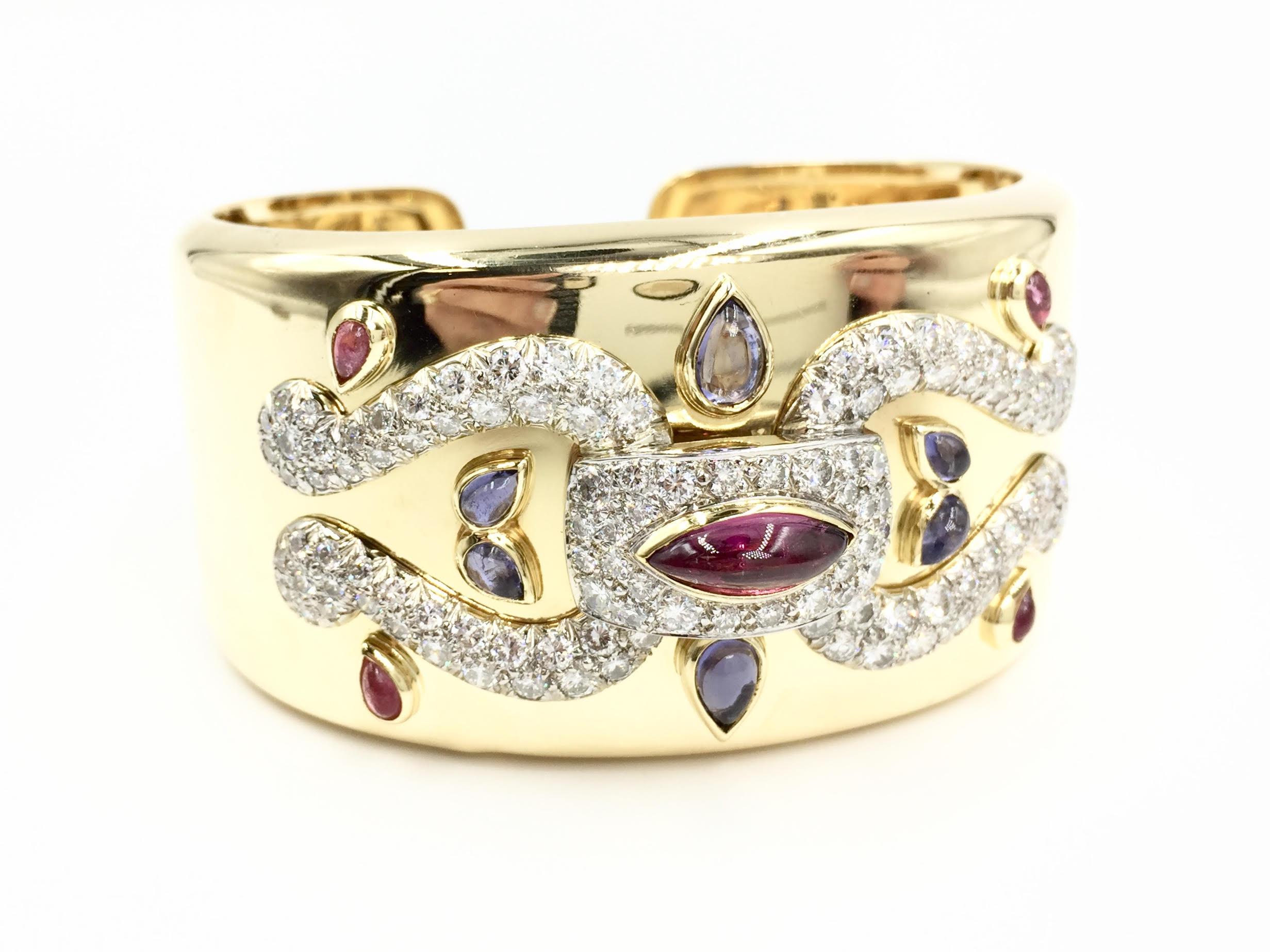 A stunning find. This vintage 18 karat yellow gold wide cuff bracelet features 120 round brilliant diamonds at 4.65 carats total weight. Diamond quality is approximately F-G color, SI1 clarity. Diamonds are expertly set in white gold, giving them an