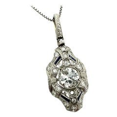 18 karat Edwardian, Sapphire, and 1.50 carat diamond pendant