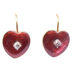 Boucles d'oreilles cœur en émail églomisé 18 carats de couleur rose avec centre en diamants