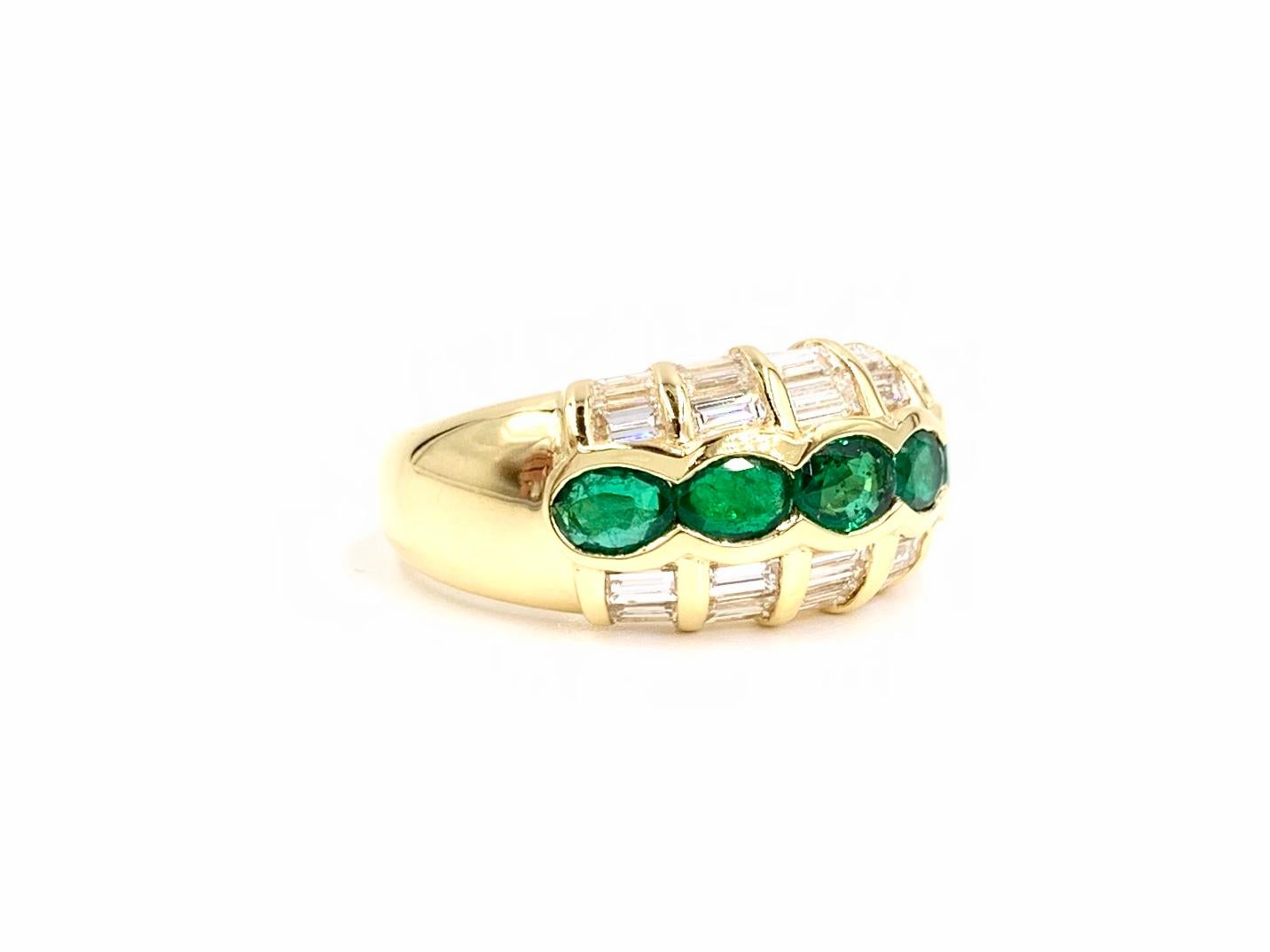 Made with superior craftsmanship, this modern and sleek low dome band style ring features 20 baguette diamonds at 1.10 carats total weight and 5 oval emeralds at 1.04 carats total weight. Emeralds have a very fine, rich green color - not too dark or