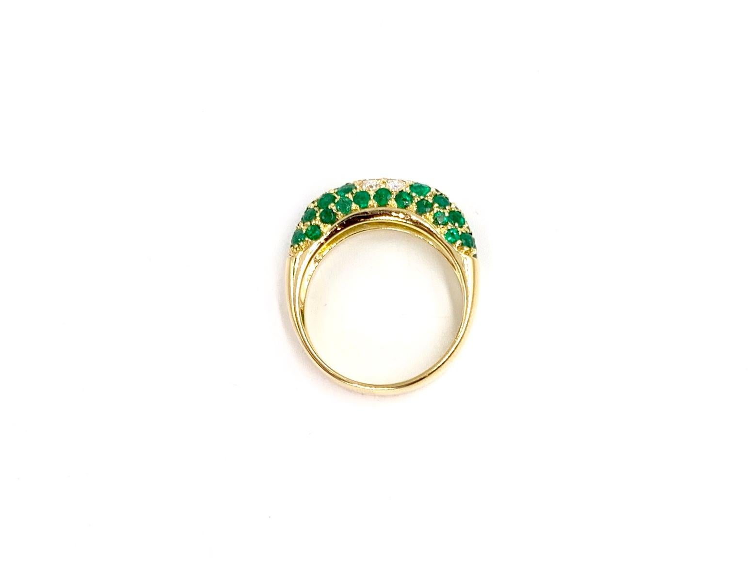 Round Cut 18 Karat Emerald and Diamond Ring For Sale