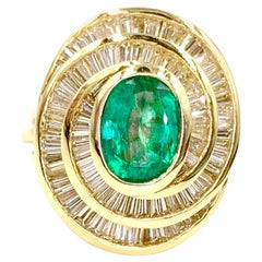 18 Karat Emerald and Diamond Swirl Cocktail Ring