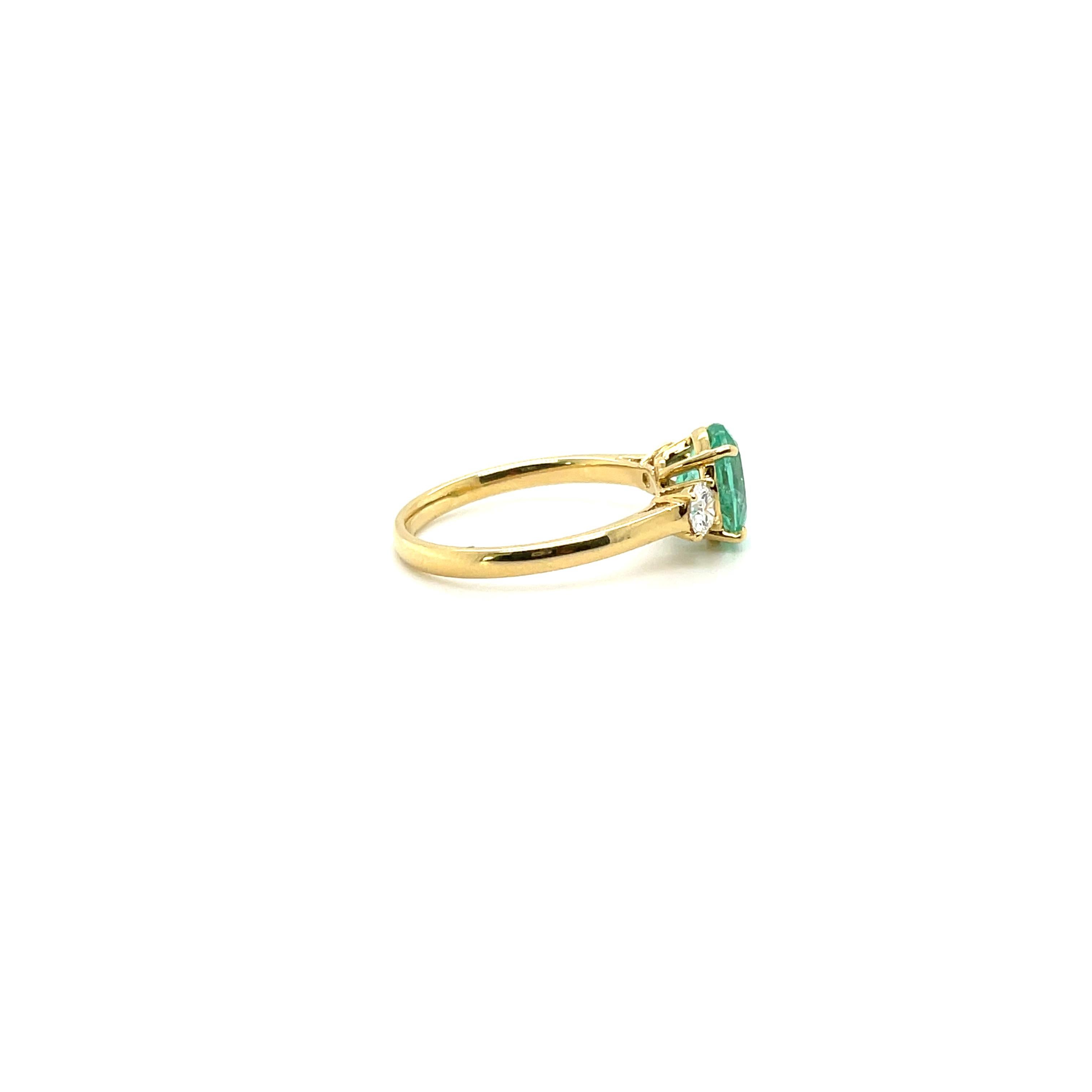 Contemporary 18 Karat Emerald and Diamond Trilogy Ring For Sale