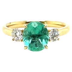 18 Karat Emerald and Diamond Trilogy Ring