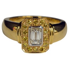 18 Karat Emerald Cut and Intense Yellow Diamond Ring