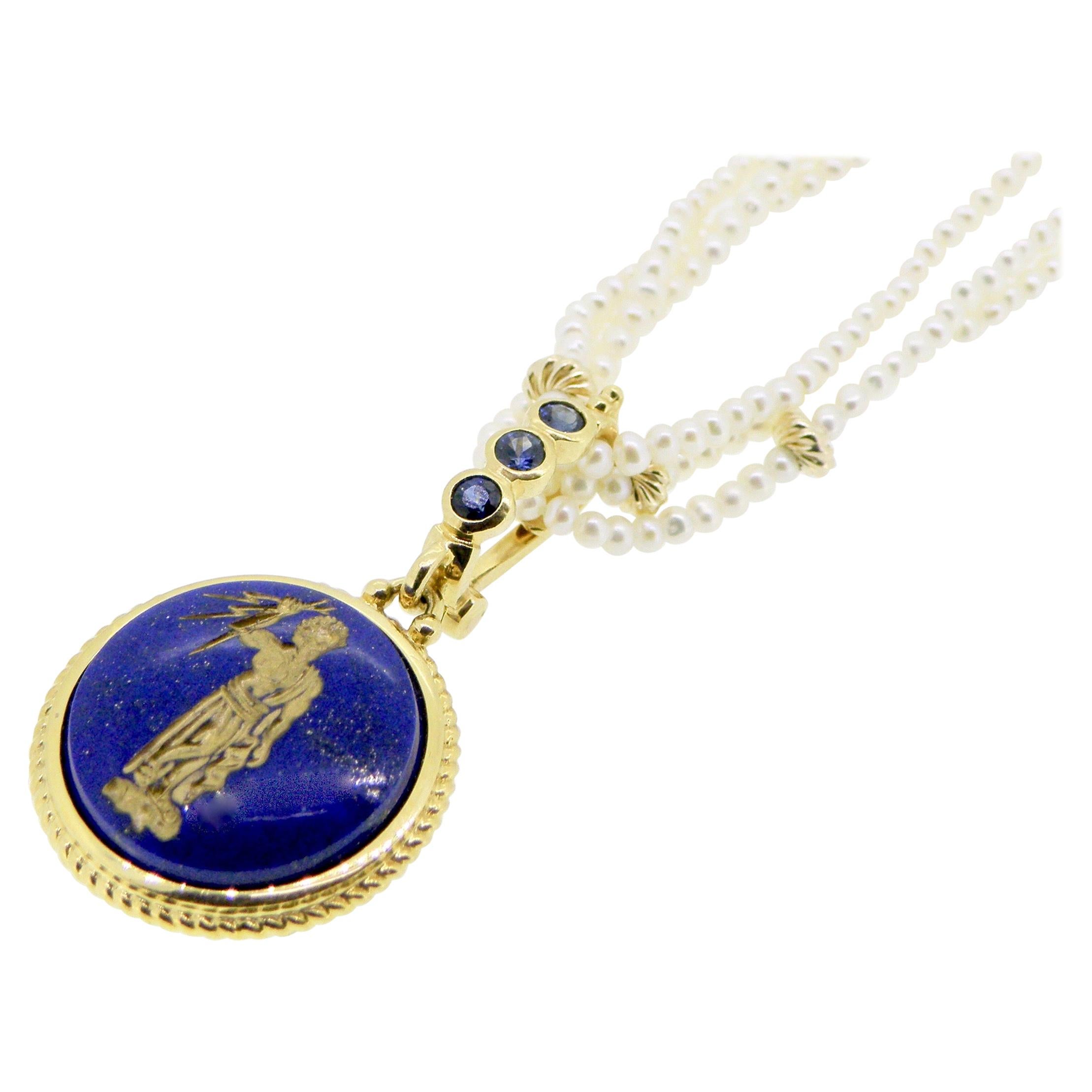 18 Karat Engraved Lapis Lazuli and Sapphire Pendant For Sale