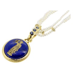 Pendentif en lapis-lazuli et saphir gravé 18 carats