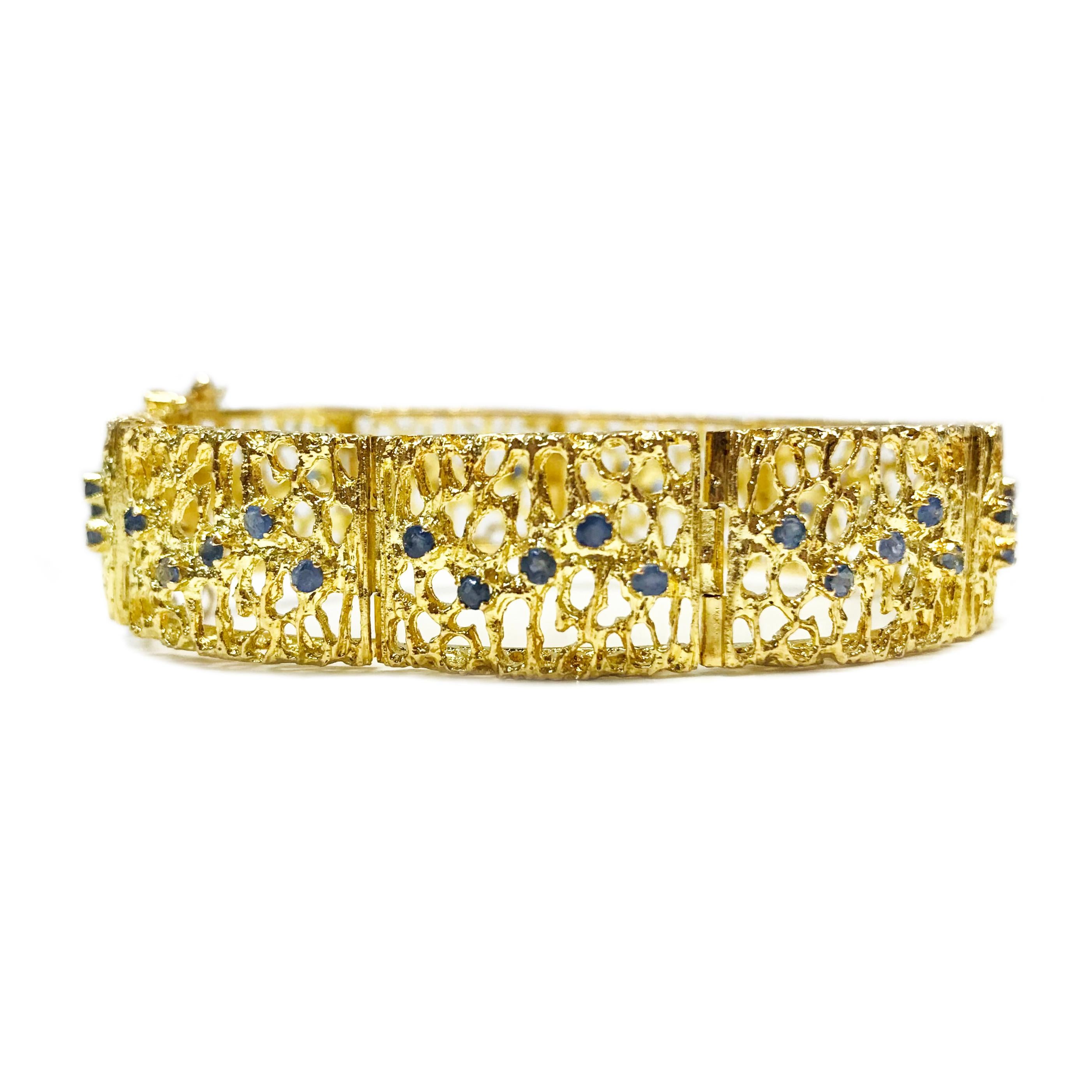 18 Karat Yellow Gold Filigree Sapphire Bracelet. This beautiful link bracelet features forty-five round 2mm prong-set blue sapphires set in nine gold rectangular filigree curved links. The total carat weight of the light blue sapphires is 1.80ctw.