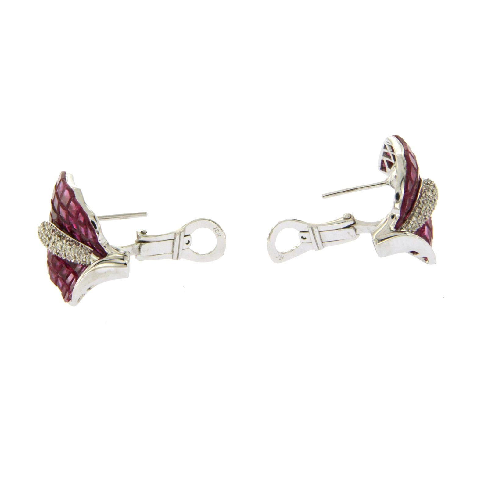 Height: 21.6 mm 
Width:15.4 mm
Metal:18K White Gold
Hallmarks: 18K
Total Weight: 10.5 Grams
Stone Type: 12.67 CT Invisible Natural Ruby and 0.09 CT G VS2 Diamonds
Condition: New
Estimated Price: $17507
Stock Number: E3237
