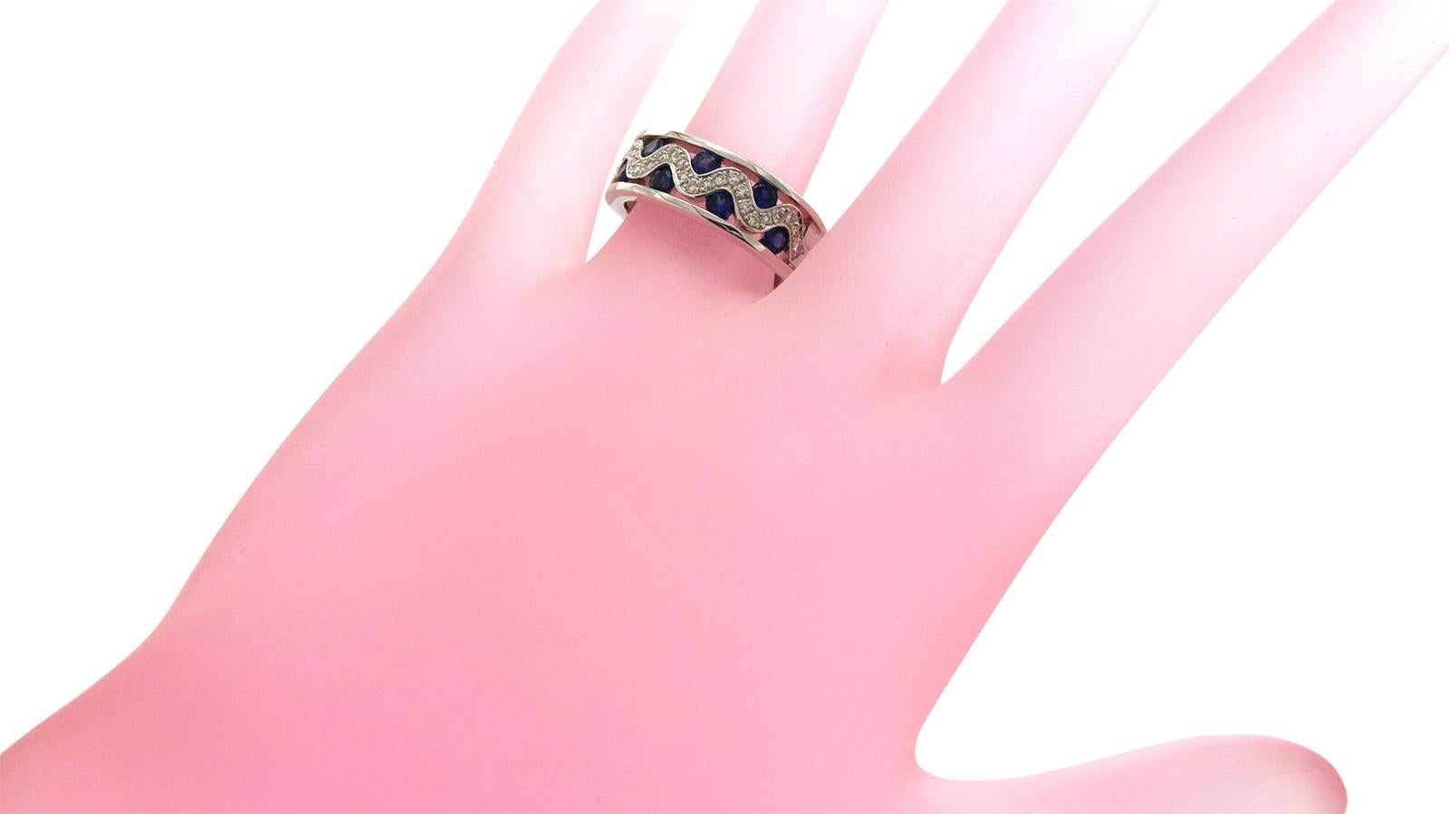 Women's 18 Karat Gold 0.26 Carat Diamonds and 1.20 Carat Blue Sapphire Wedding Band Ring For Sale