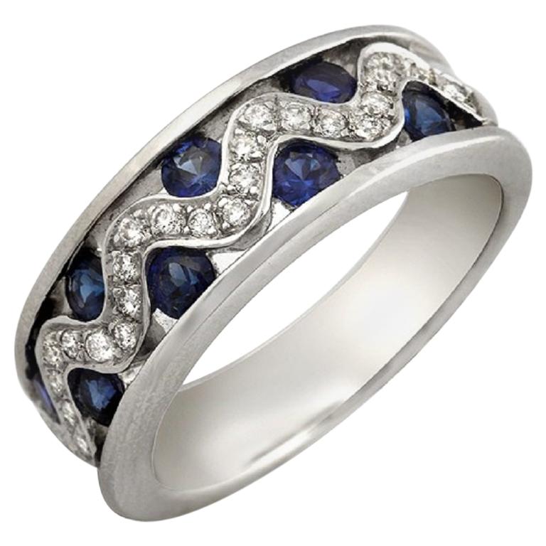 18 Karat Gold 0.26 Carat Diamonds and 1.20 Carat Blue Sapphire Wedding Band Ring For Sale