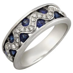 Alliance en or 18 carats avec diamants de 0,26 carat et saphir bleu de 1,20 carat