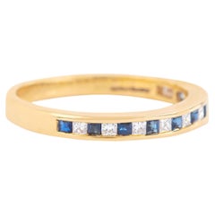 18 Karat Gold 0.45 Carat Diamond and Sapphire Half Band Ring