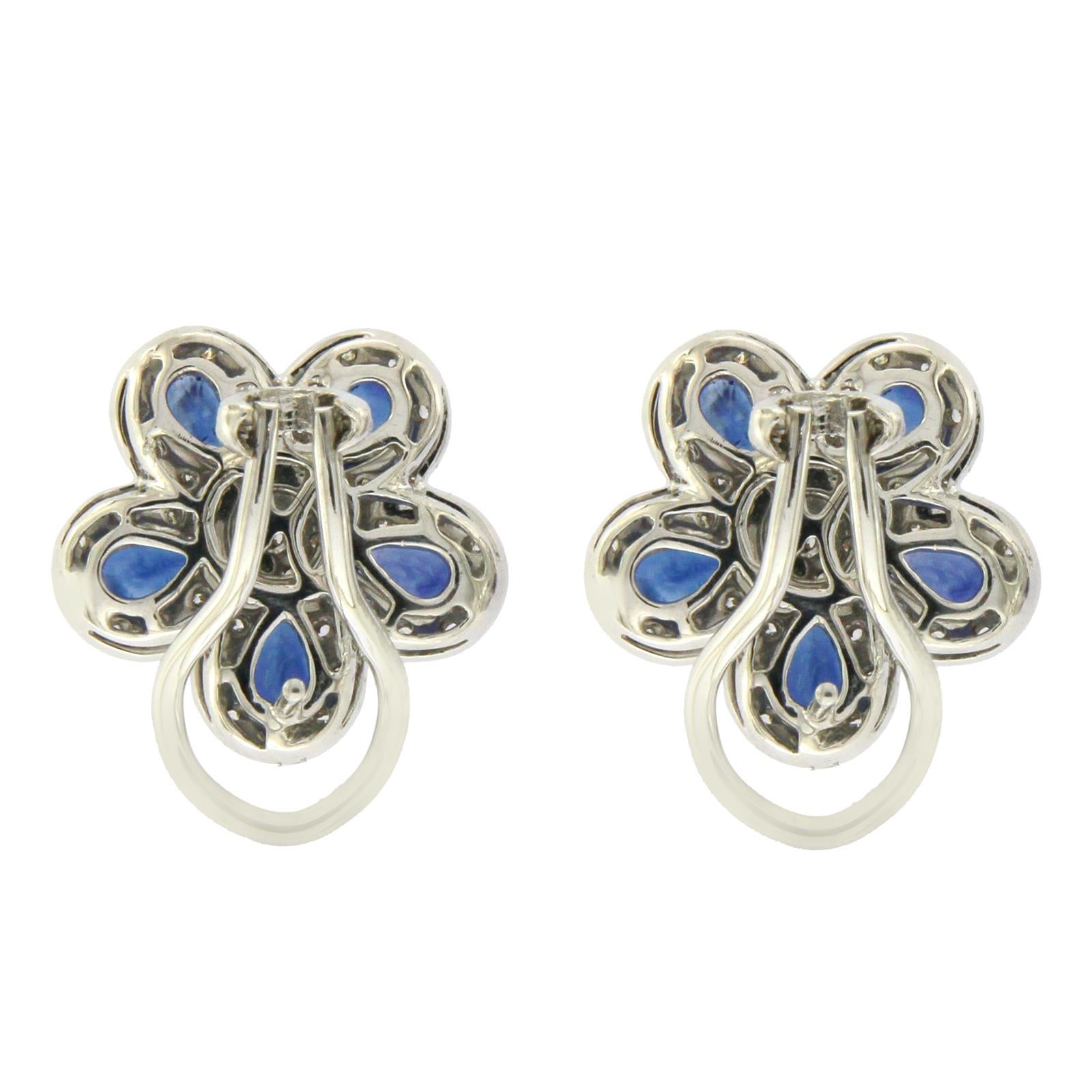 Women's 18 Karat Gold 0.75 Carat Diamonds and 2.66 Carat Blue Sapphire Flower Earrings For Sale