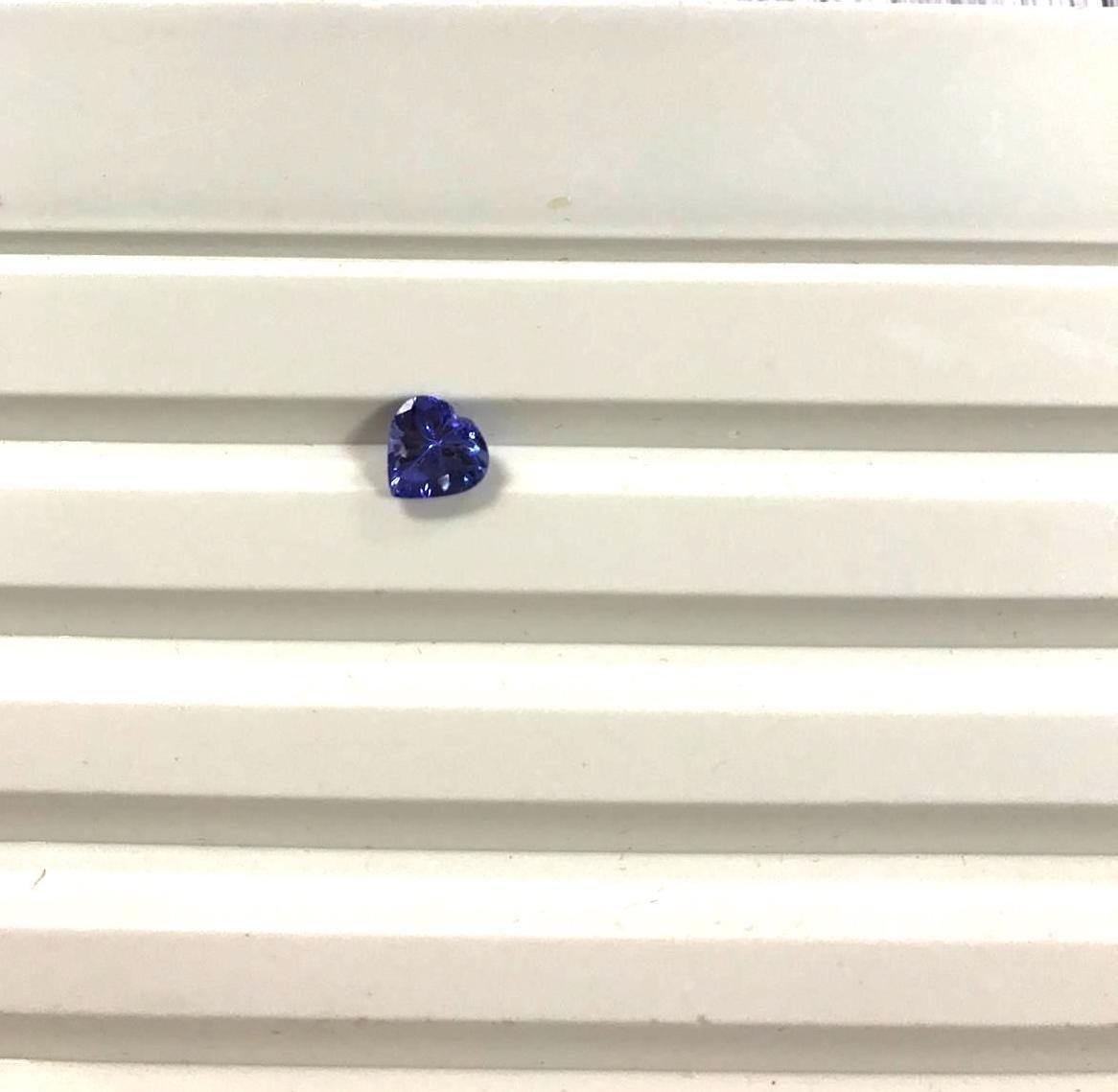 Women's 18 Karat Gold 0.78 Karat Tanzanite 0.50 Karat White Diamonds Love Ring For Sale