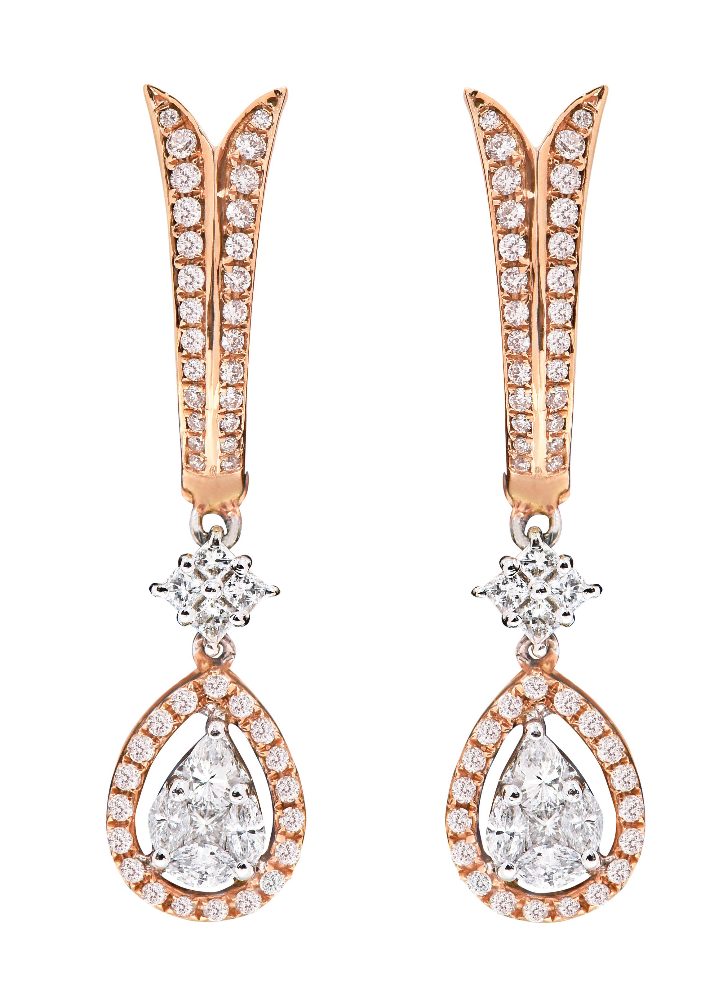 18 Karat Gold 0.79 Carat Diamond Pear Drop Earrings

This ingenious invisible pear set diamond earring is fabulous. The invisible set diamond pear drop in solid rose gold is an elegant design wherein 4 solitaire marquise on the sides and 1 square