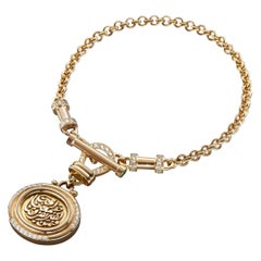 18 Karat Gold, 0.94 Carat Diamond and Pearl Calligraphy T-Lock Love Bracelet