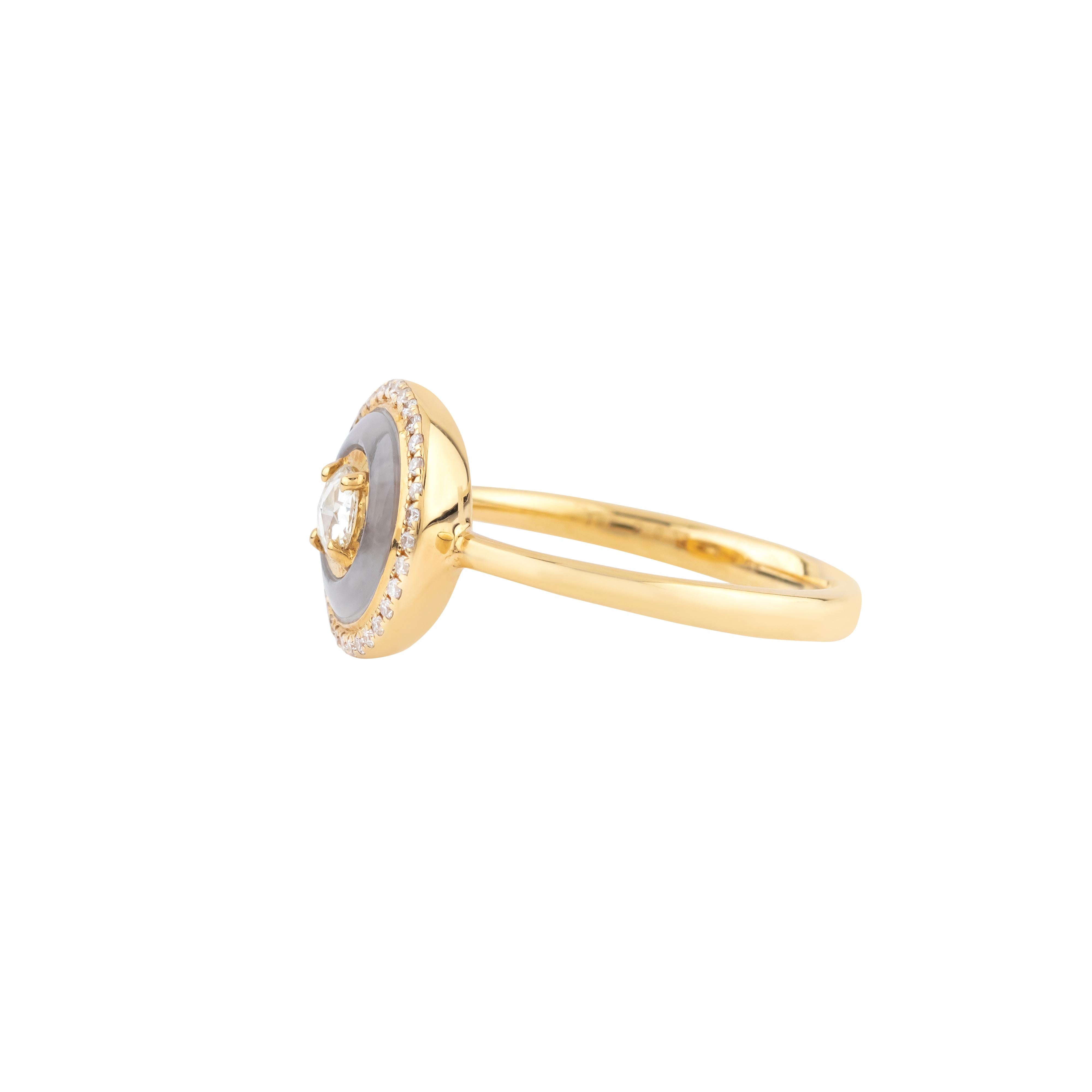 Crafted with meticulous attention to detail, the 18 Karat Gold 0.97 Carat Diamond and Chalcedony Fashion Ring embodies a refined blend of sophistication and modern elegance. The ring features a central chalcedony, celebrated for its smooth, lustrous