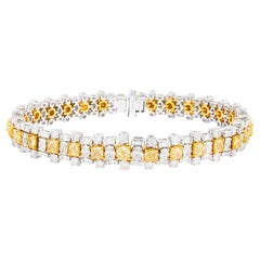 Bracciale tennis in oro 18 carati con diamanti gialli e diamanti da 10,691 carati