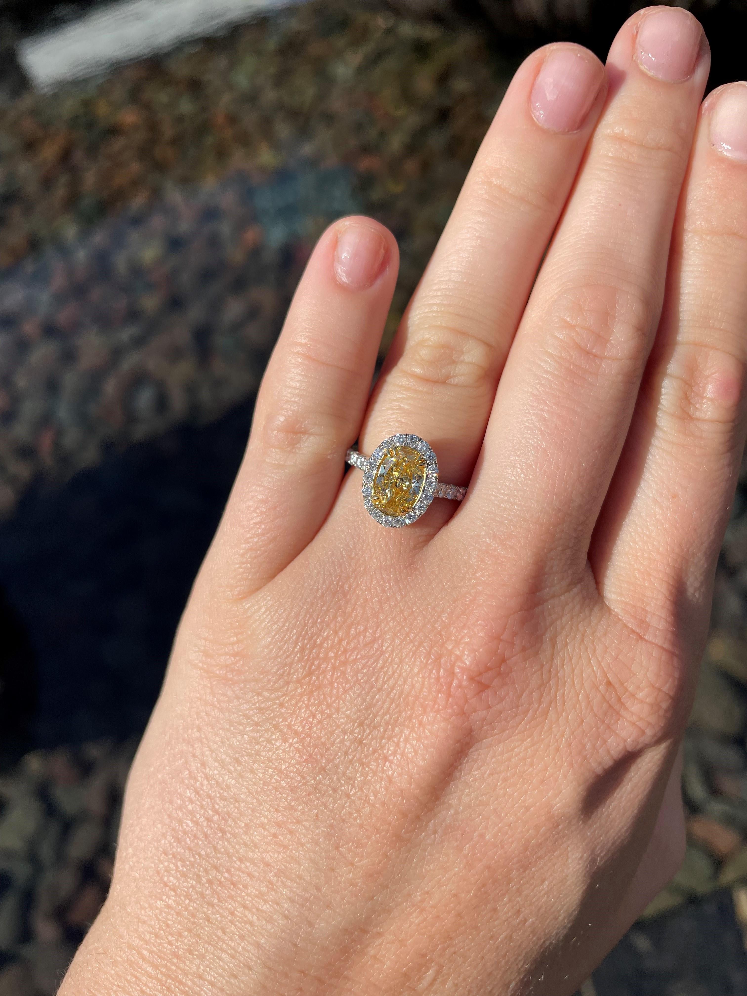 oval yellow diamond engagement ring