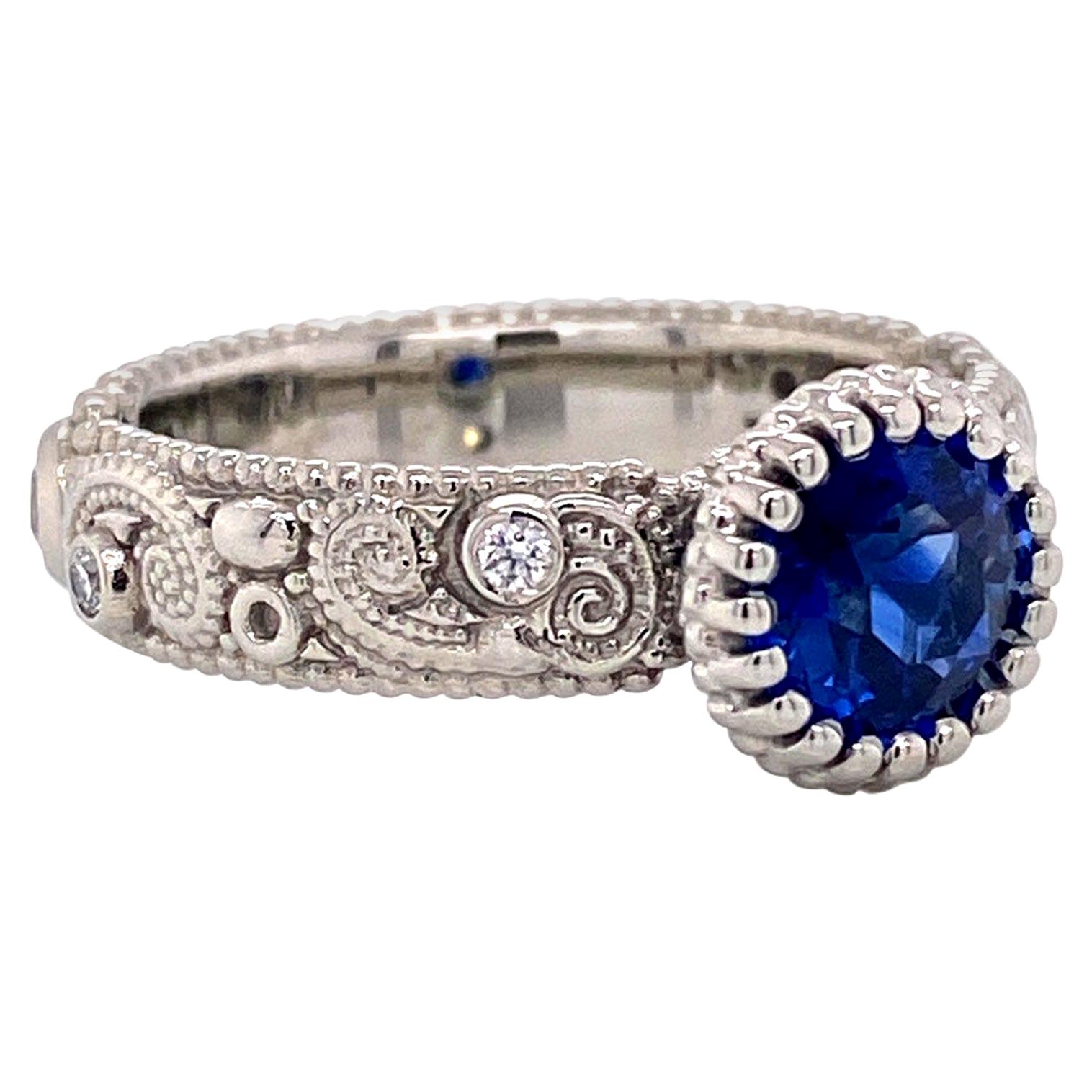 18 Karat Gold 1.09 Carat Blue Sapphire Swirl Pattern Ring with White Diamonds