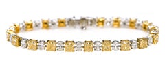 18 Karat Gold 15.31 Solitaire Fancy Yellow and White Diamond Tennis Bracelet