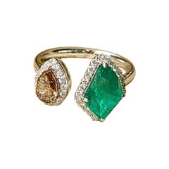 18 Karat Gold, 1.17 Carats, Fancy Shaped Emerald and Brown Diamond Cocktail Ring