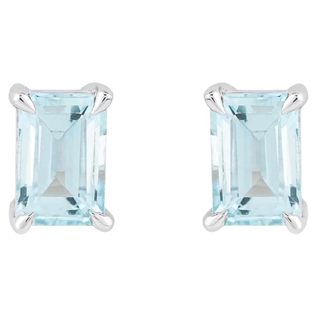 Enter a world of timeless sophistication with our 18 Karat Gold 1.21 Carat Aquamarine 'Emerald Cut' Stud Earrings, where each piece embodies the essence of refined luxury. Crafted with precision and care, these earrings are a testament to our