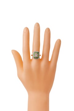 18 Karat Gold 1.22 Carat Diamond "Invisible-Set" and Tsavorite Cluster Ring