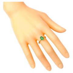 18 Karat Gold 1.25 Carat Natural Emerald Solitaire Ring in Four-Prong Setting