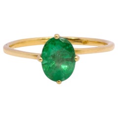 18 Karat Gold 1.25 Carat Natural Emerald Solitaire Ring in Four-Prong Setting