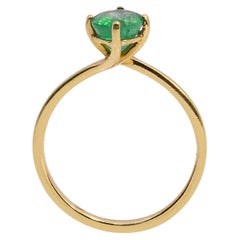 18 Karat Gold 1.25 Carat Natural Emerald Solitaire Ring in Four-Prong Setting
