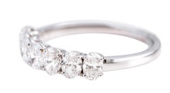 18 Karat Gold 1.27 Carat Solitaire Oval-Cut Diamond Half Band Eternity Ring
