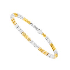 Bracciale tennis in oro 18 carati con diamanti gialli e diamanti da 12,7 carati