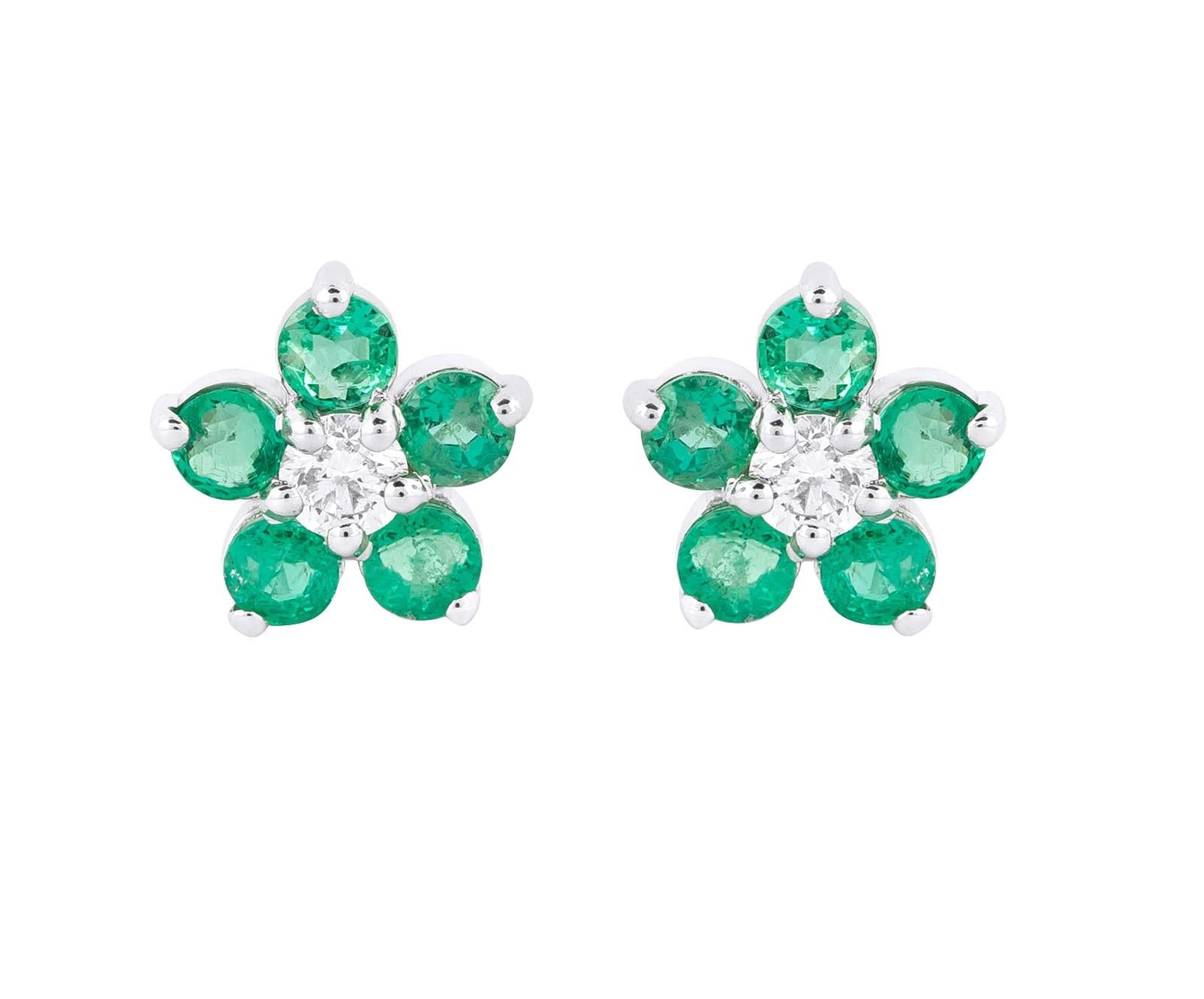 Indulge in the sophistication and allure of our 18 Karat Gold 1.28 Carat Diamond and Emerald Flower Modulation Earrings. Each pair is a testament to exquisite craftsmanship and thoughtful selection, harmonizing tradition with contemporary
