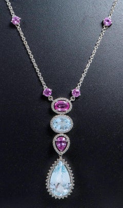 18 Karat Gold 12.81 Carat Aquamarine, Sapphire, and Diamond Pendant Necklace