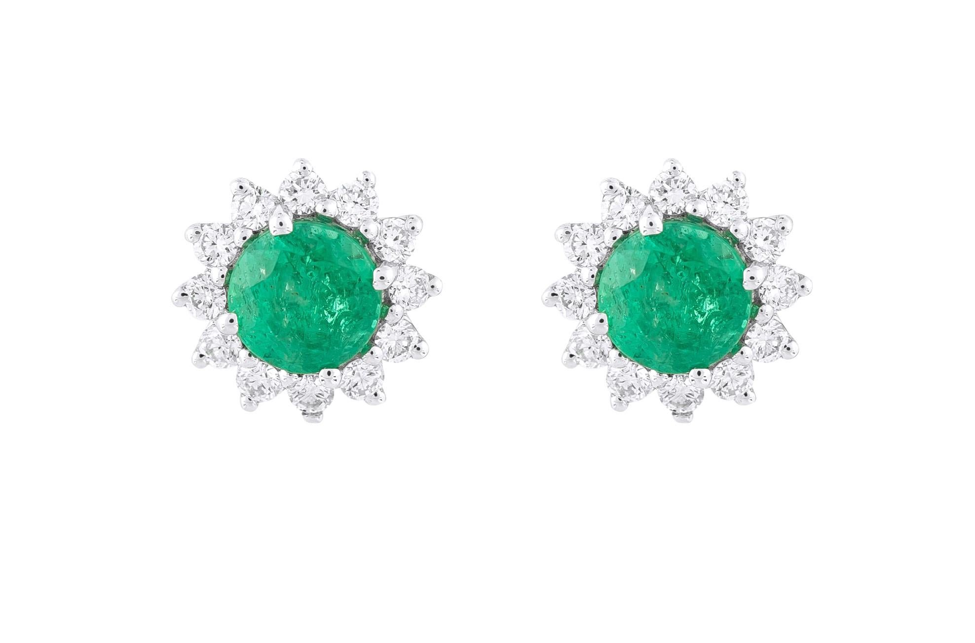 Step into a world of sophistication and elegance with our 18 Karat Gold 1.29 Carat Diamond and Emerald Solitaire Stud Earrings. Each of these pieces is a unique testament to expert craftsmanship and thoughtful curation, celebrating a seamless blend