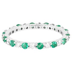 Anillo de oro de 18 quilates con diamante de 1,34 quilates y esmeralda talla brillante