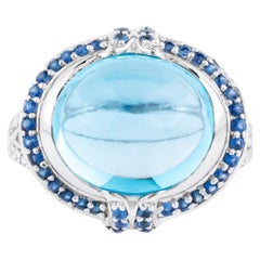 Bague cocktail en or 18 carats, pierre de couleur 14,4 carats et diamants