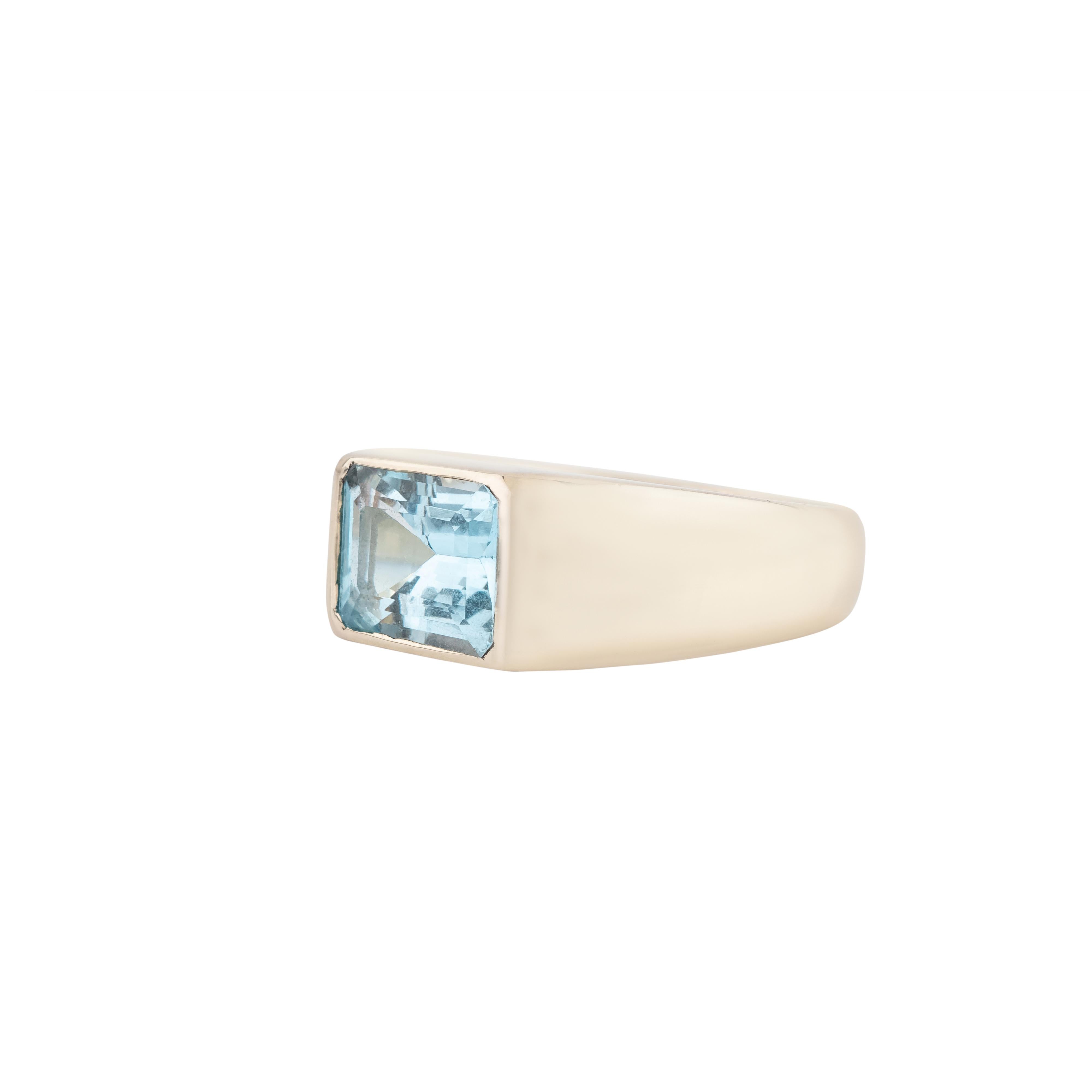 Encapsulating timeless elegance and vibrant charm, this 18 Karat Gold 1.45 Carat Aquamarine Cocktail Ring showcases a seamless balance between sophistication and artistry. The striking aquamarine gemstone, with its exquisite clarity and finely