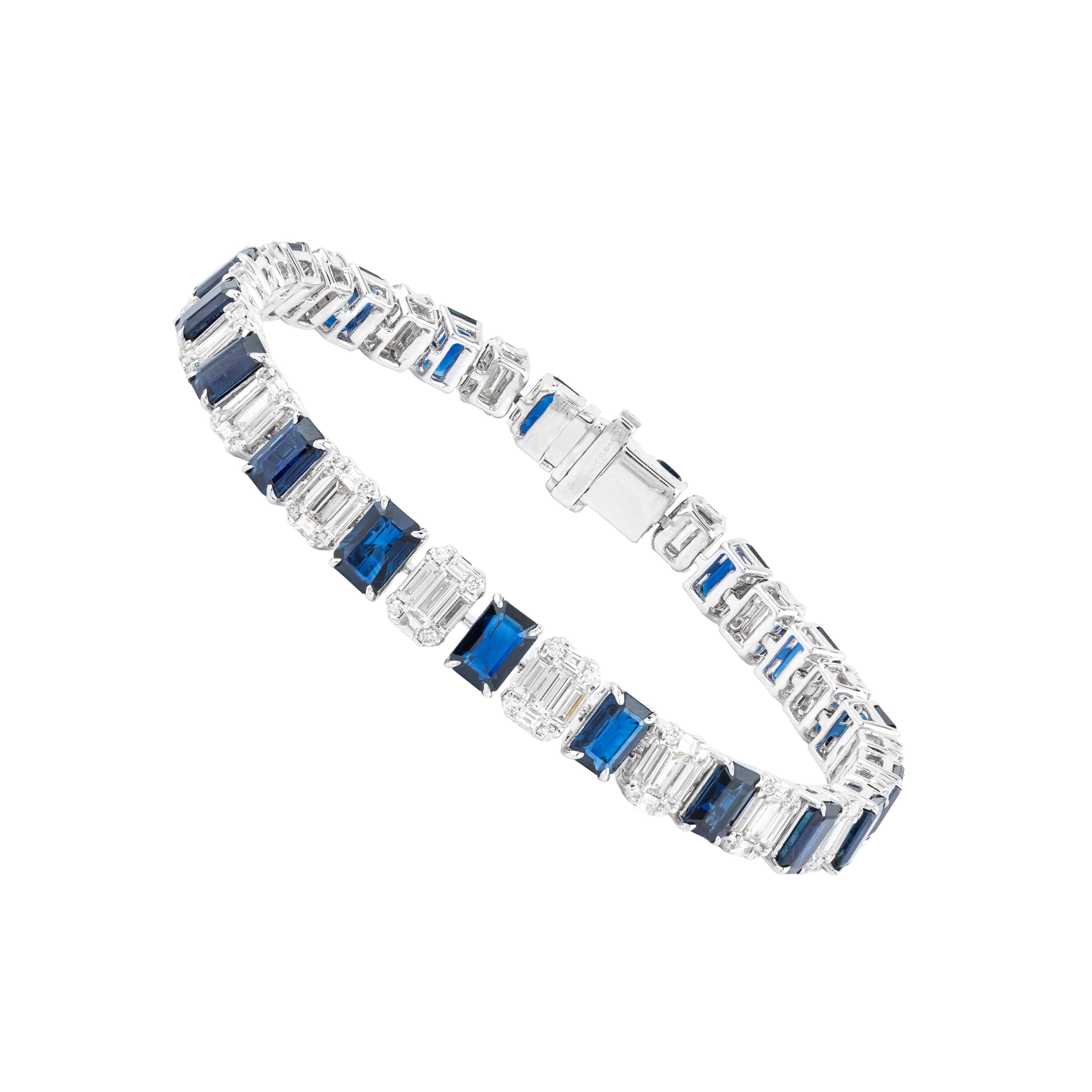 This 18 Karat Gold Tennis Bracelet showcases the luxurious allure of 14.909 carats of sapphires and diamonds, thoughtfully arranged to offer an elegant interplay of light and color. The bracelet features a series of sapphires, each carefully