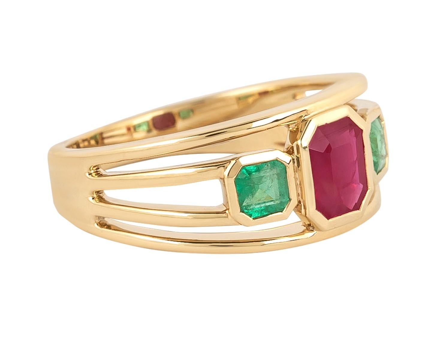 Crafted with an exceptional eye for detail, the 18 Karat Gold 1.51 Carat Emerald and Ruby 