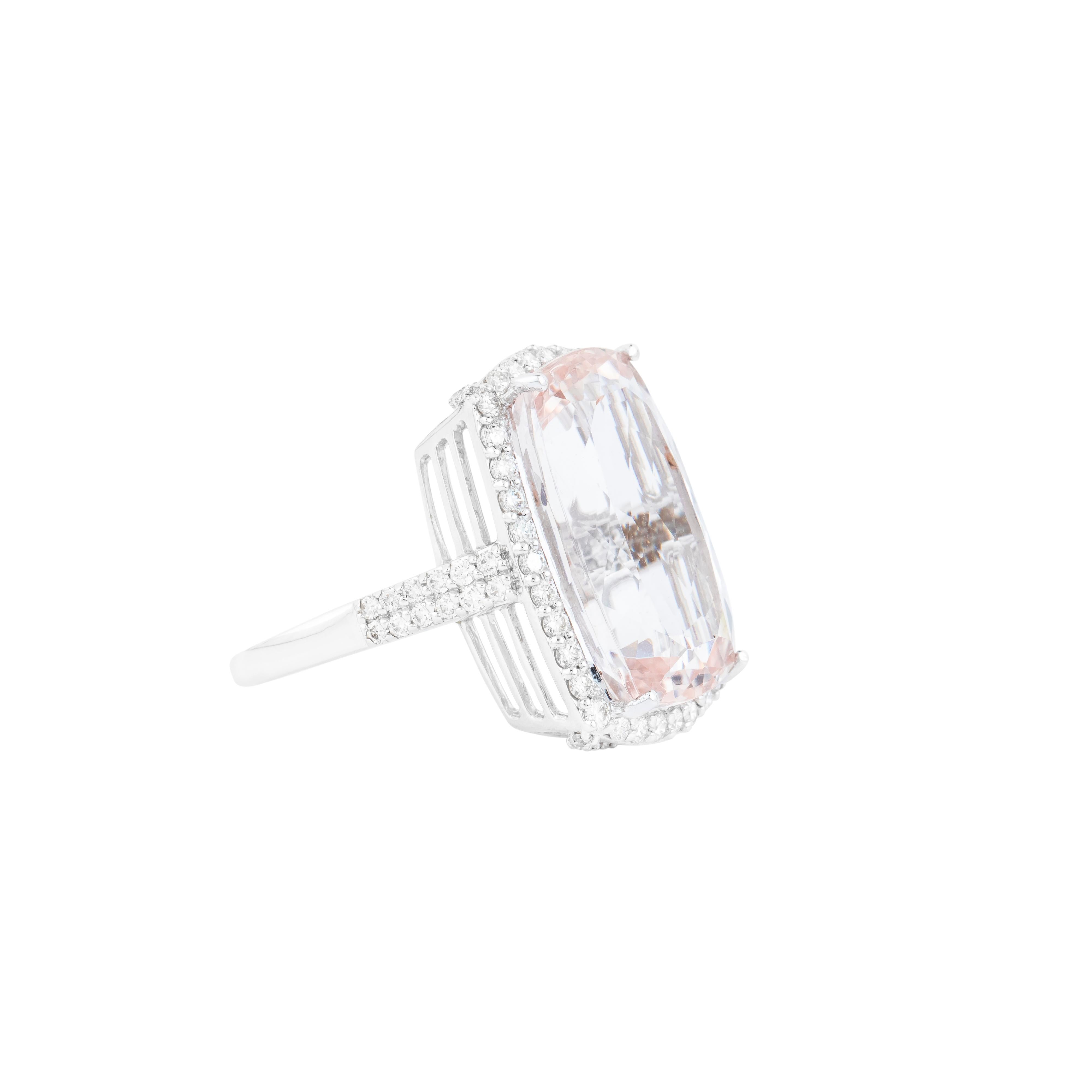 The 15.36-carat morganite takes center stage in this exquisitely designed solitaire ring, exuding an ethereal charm with its exceptional clarity and brilliance. Expertly cut to maximize light reflection, the gemstone’s elongated silhouette creates a