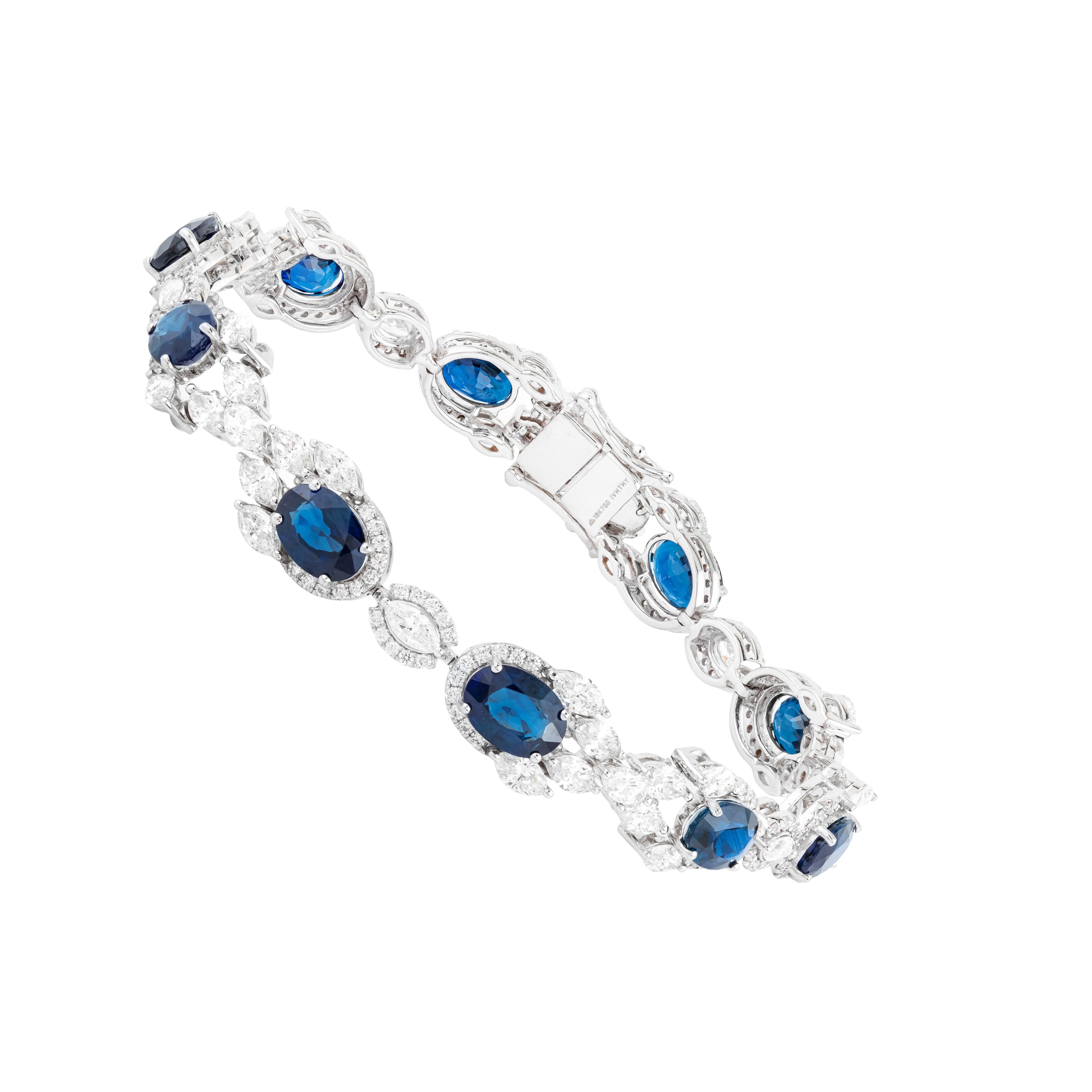 This 18 Karat Gold Tennis Bracelet captivates with its harmonious blend of 15.86 carats of sapphires and diamonds, showcasing a refined design that exudes luxury and sophistication. A series of expertly selected sapphires are seamlessly interspersed