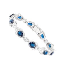 18 Karat Gold 15,86 Karat Saphir und Diamant-Tennisarmband