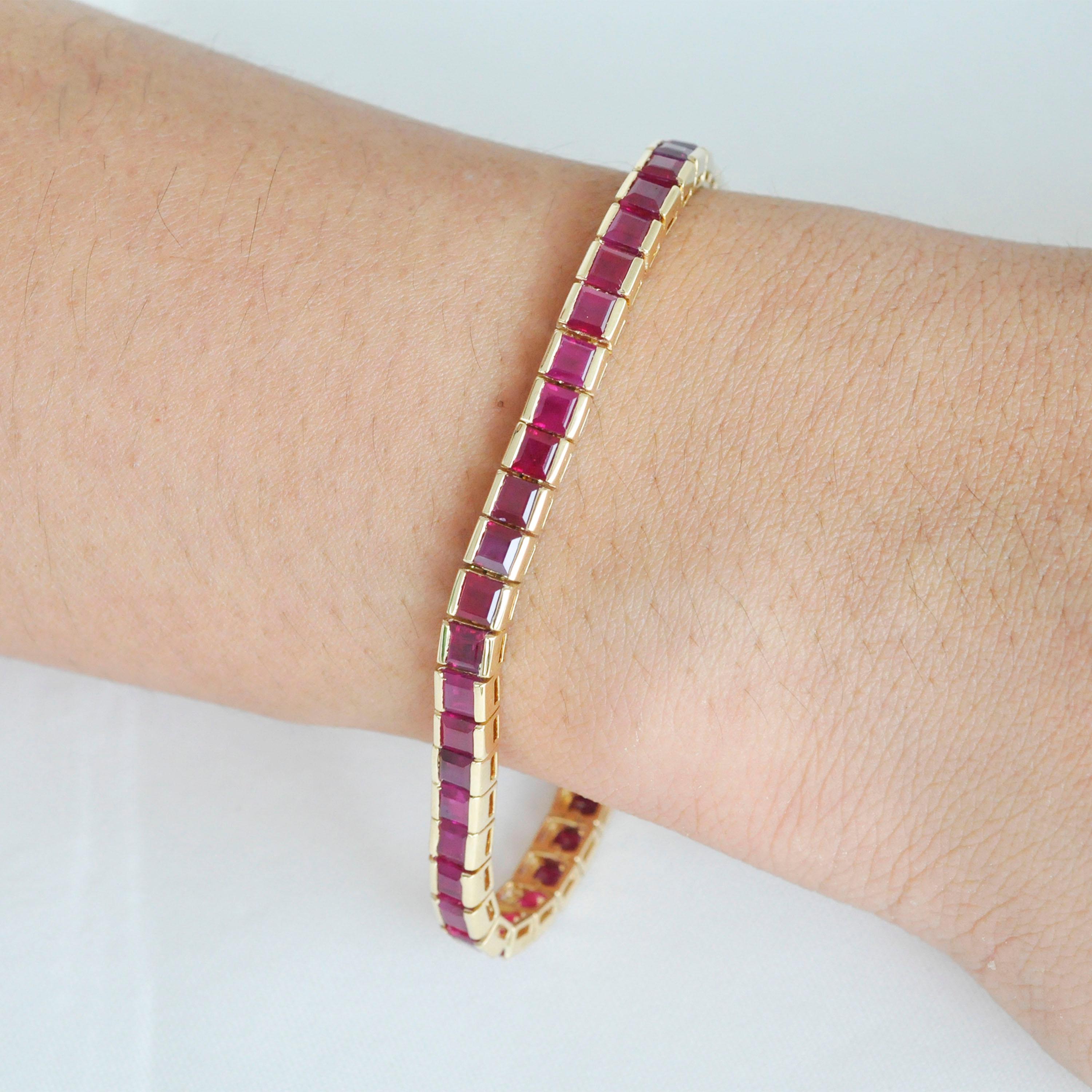 18 karat gold 15.93 carat square natural Mozambique ruby tennis line bracelet.

This masterful luscious deep red ruby tennis bracelet is superb. The identical 48 matching squares rubies of size 4 mm in the center and graduating to 3.5mm at the clasp