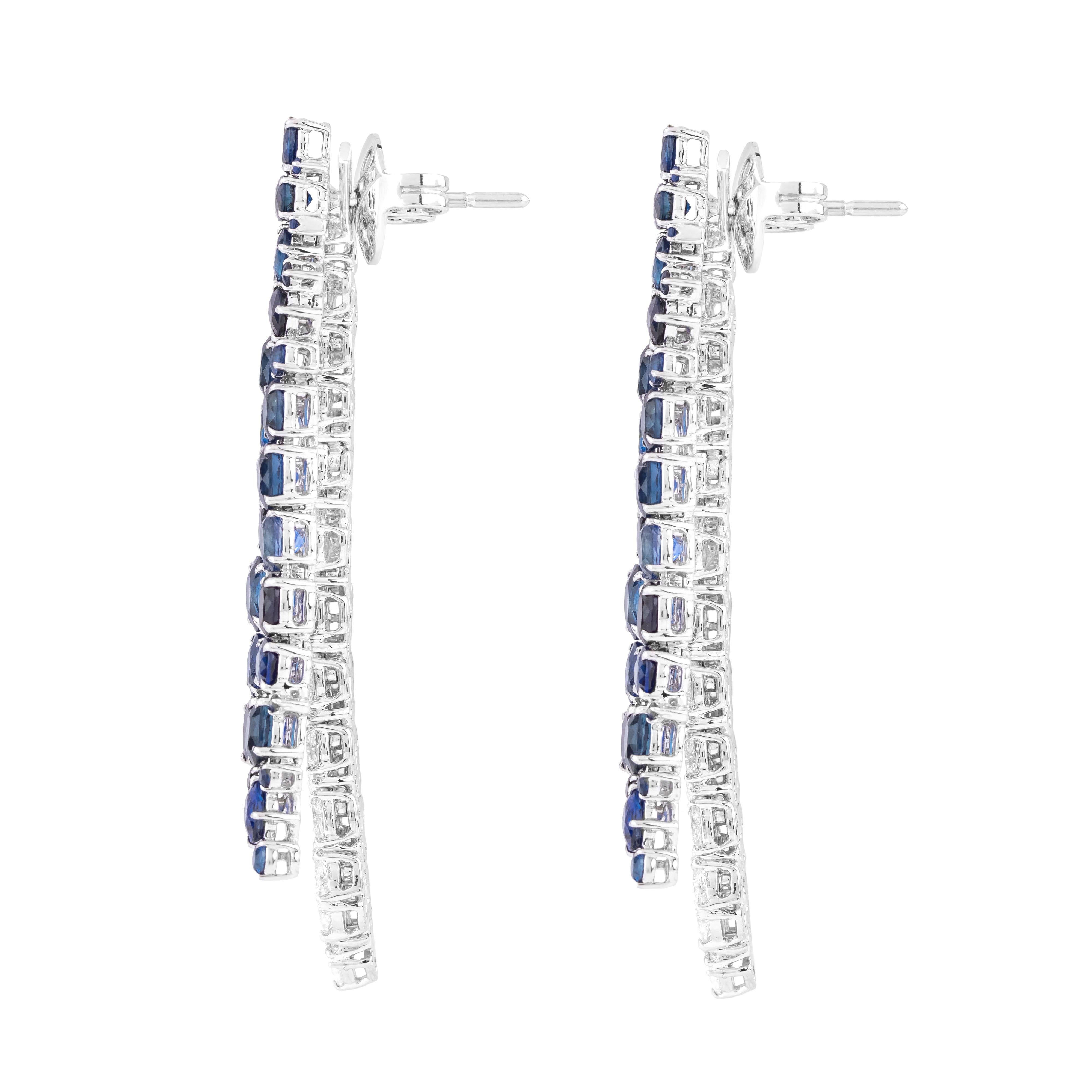 Concediti l'epitome dell'eleganza con i nostri orecchini da cocktail in oro 18 carati con zaffiro blu e diamanti da 16,27 carati. Realizzato con una meticolosa attenzione ai dettagli, ogni pezzo è una testimonianza di raffinatezza e